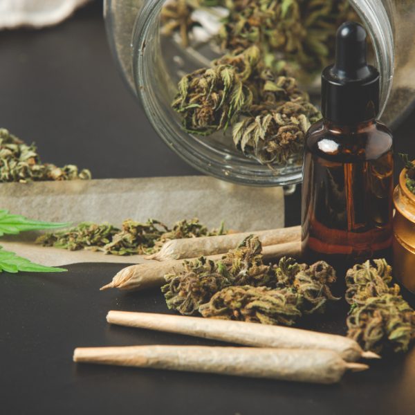 marijuana-buds-with-marijuana-joints-and-cannabis-oil marijuana-buds-with-marijuana-joints-and-cannabis-oil