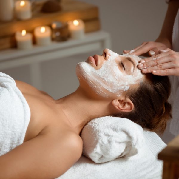 young-woman-in-mask-for-face-relaxing-in-spa-salon young-woman-in-mask-for-face-relaxing-in-spa-salon