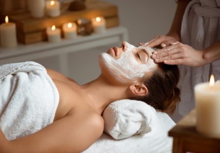 young-woman-in-mask-for-face-relaxing-in-spa-salon young-woman-in-mask-for-face-relaxing-in-spa-salon